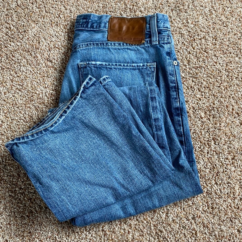 Excellent condition with the exception of one leg that has a small fray in hem